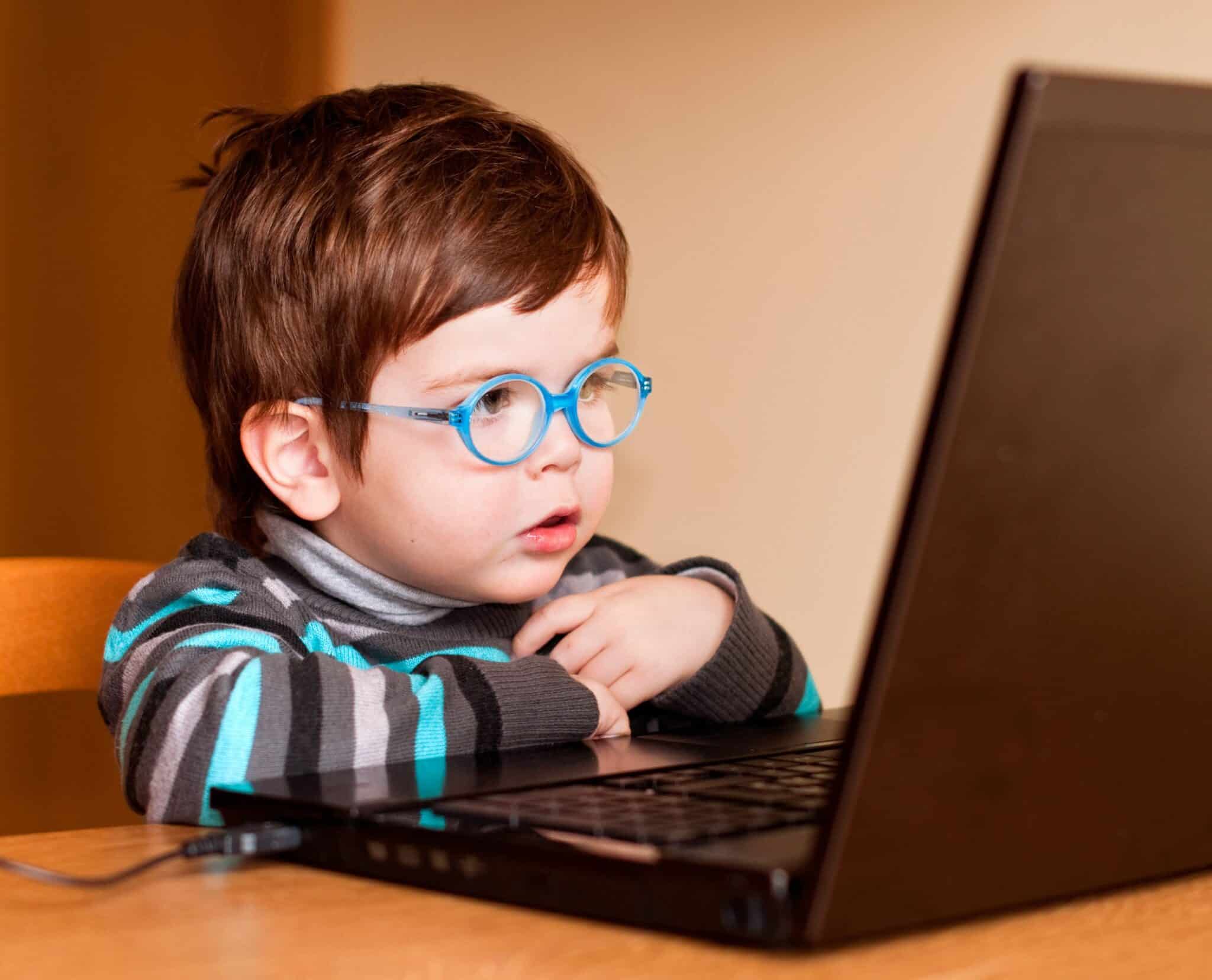 Child using a notebook
