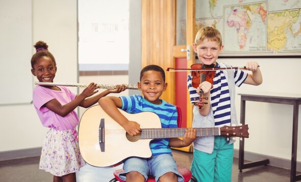 Niños En Clase De Música